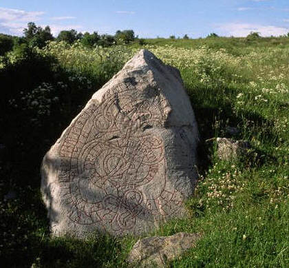 A rune stone in the garden of an ancient temple, Sweden